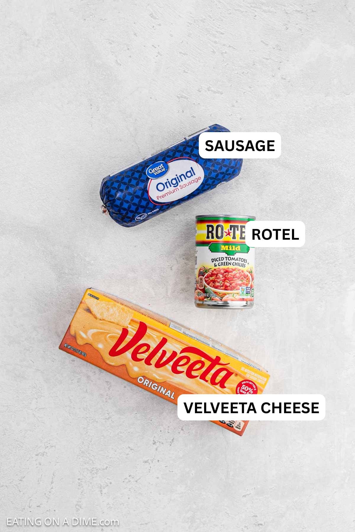 Ingredients needed to make this recipe which includes velveeta cheese, rotel, and ground sausage.