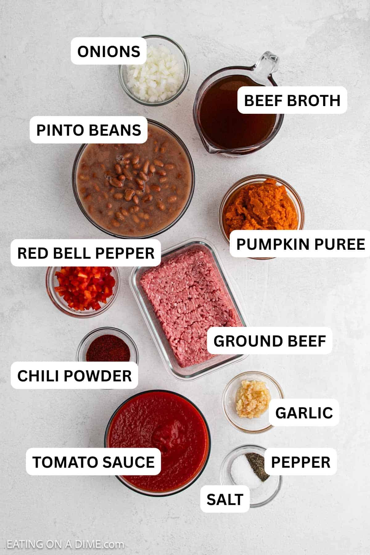 Ingredients needed for this recipe includes ground beef, pumpkin puree, tomato sauce, pinto beans, beef broth and more.