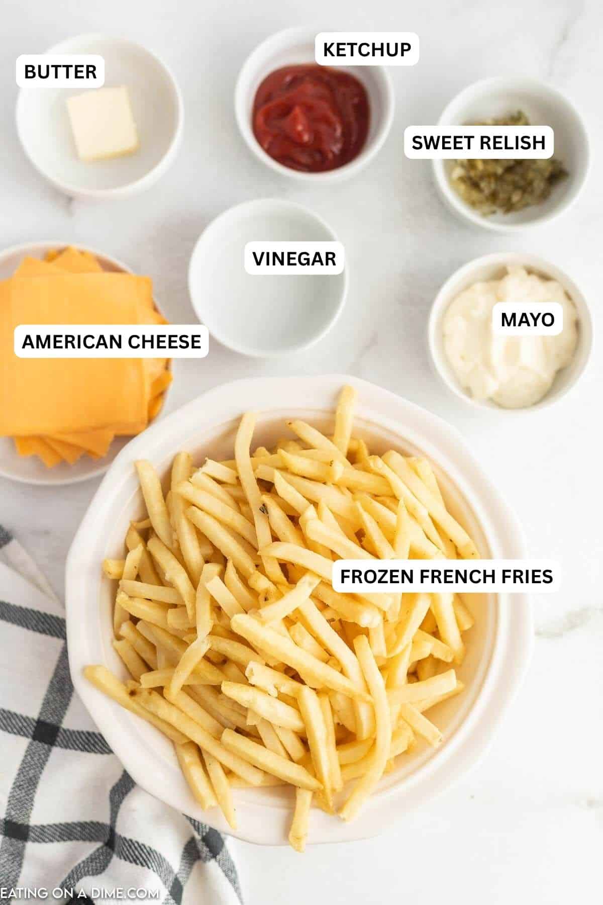 Ingredients for recipe: frozen French fries, mayo, vinegar, American cheese, relish, ketchup and butter.