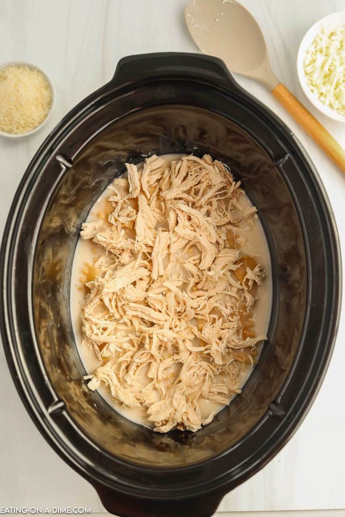 Adding chicken to the slow cooker