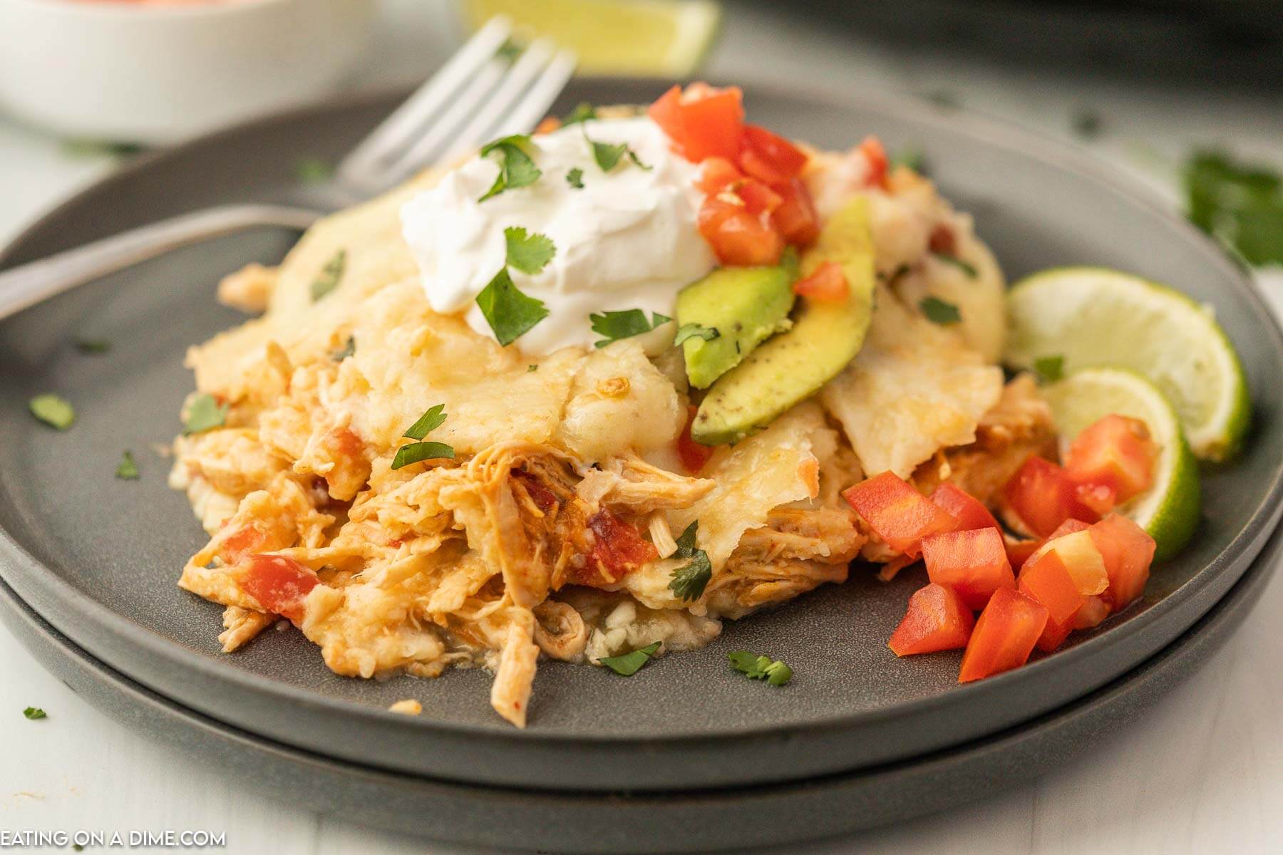 slow cooker chicken enchilada casserole on a plate