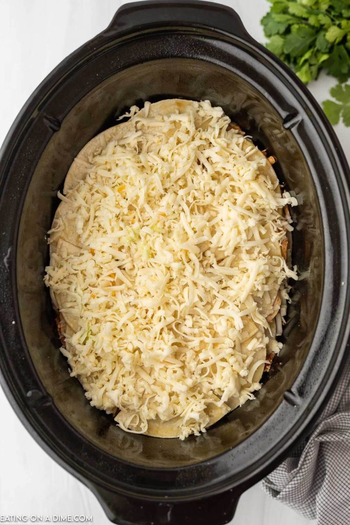 Casserole in the slow cooker topped with cheese