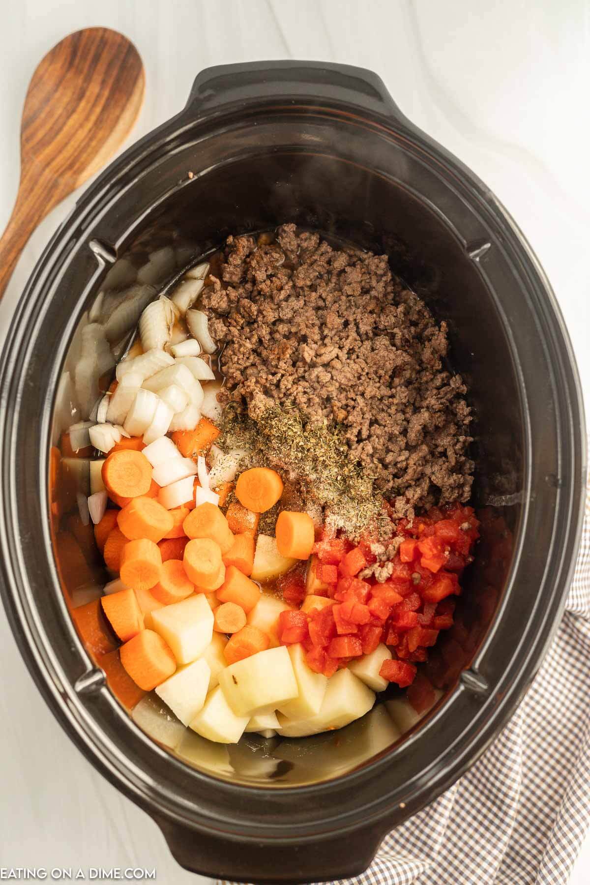 Adding the ingredients to the slow cooker