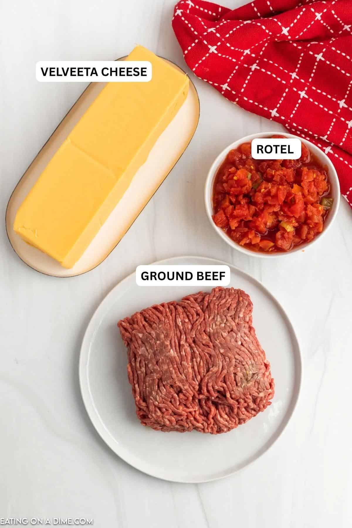 Crock Pot Rotel Dip Recipe is our go to appetizer for parties, game day and more! This dip is so tasty and amazing for an instant crowd pleaser! Ingredients for recipe - ground beef, rotel, velveeta.