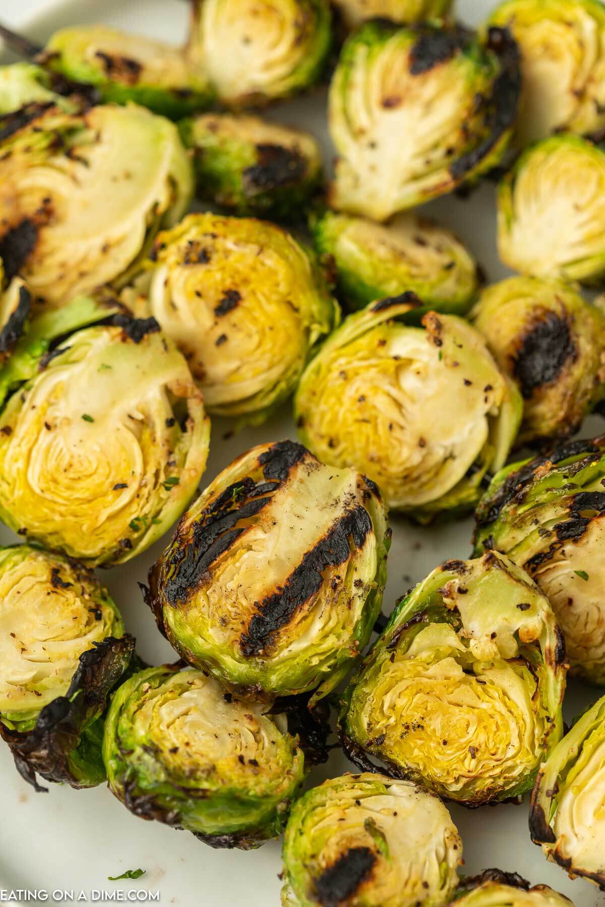 Grilled brussel sprouts on a plate. 