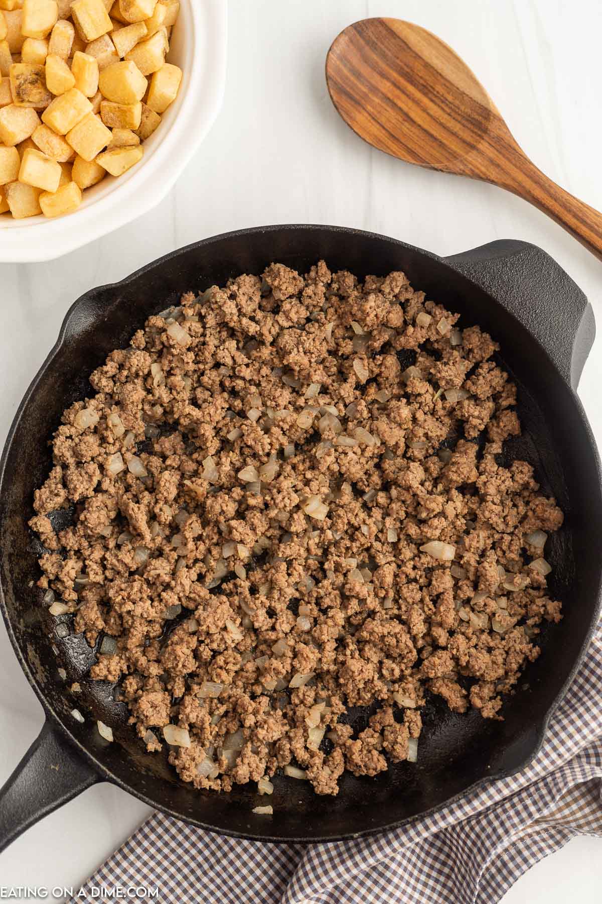Cooking ground beef in diced onions