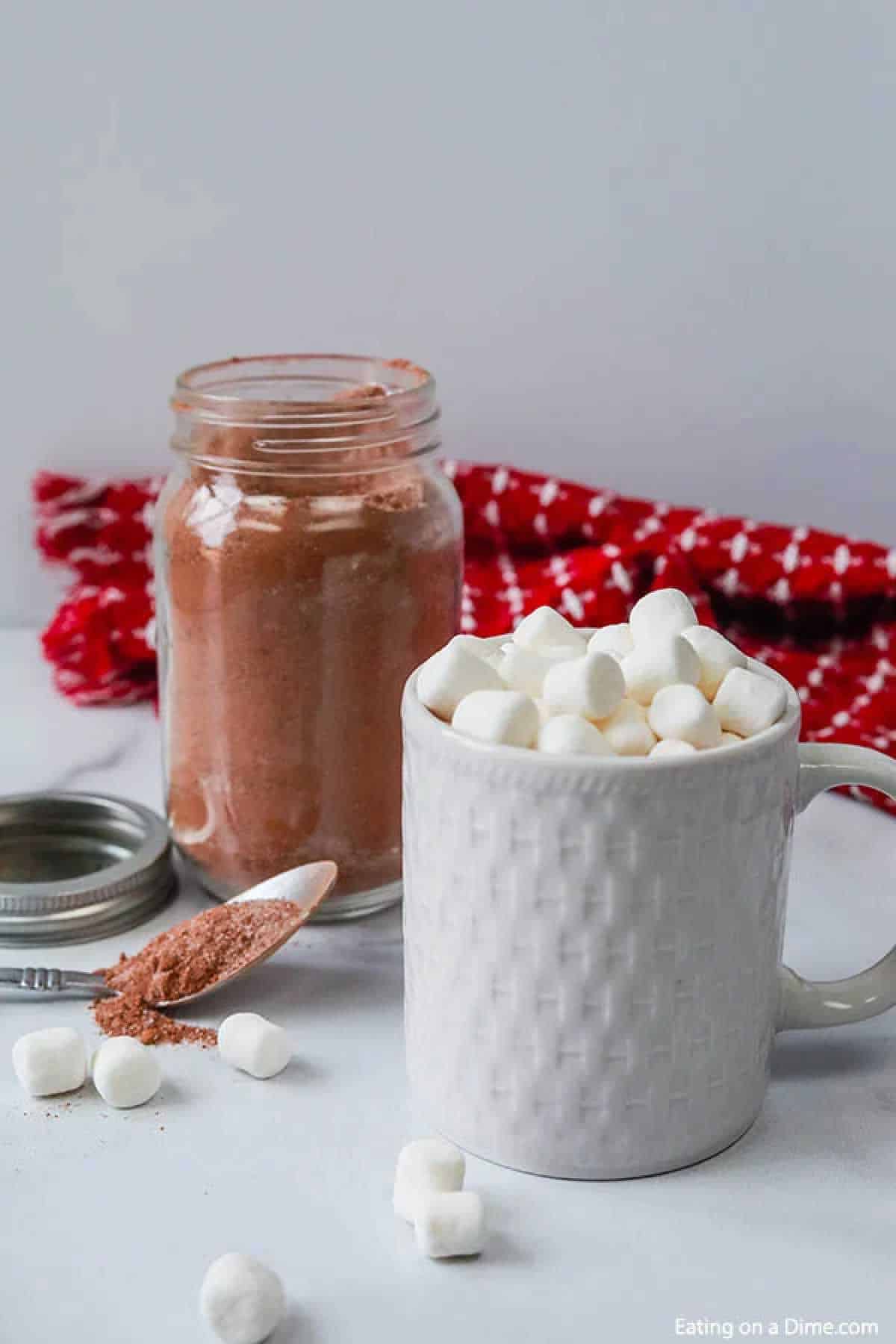 You are going to love this homemade hot chocolate mix recipe that you can easily store in a jar. I always have this in my pantry and itโs great to give this Instant Hot Chocolate mix as a gift as well. I hope you enjoy this DIY hot cocoa mix. #eatingonadime #hotchocolatemix #giftsinajar