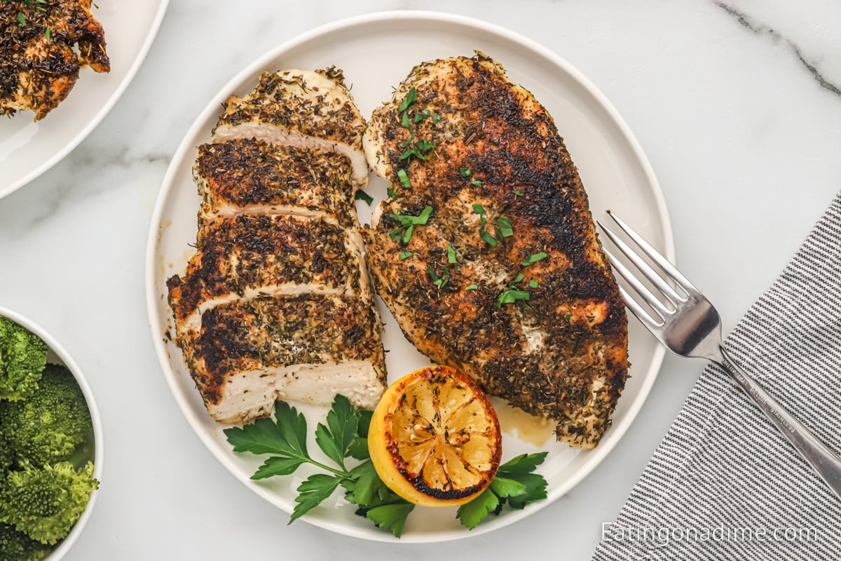 Herb Crusted Chicken sliced on a plate