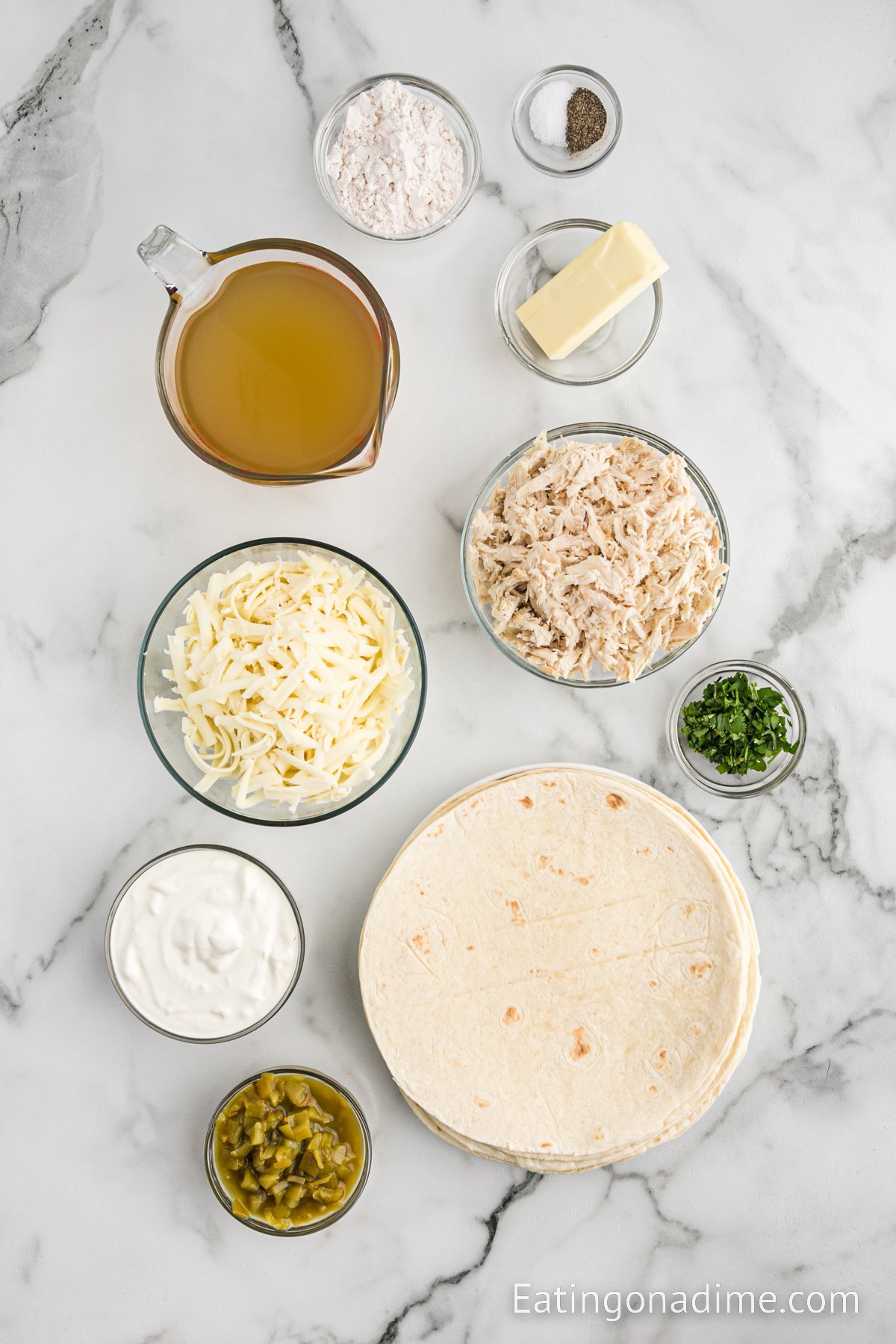 Ingredients needed - chicken, salt and pepper, monterey jack cheese, flour tortilla, butter, flour, chicken broth, green chiles, sour cream, fresh cilantro