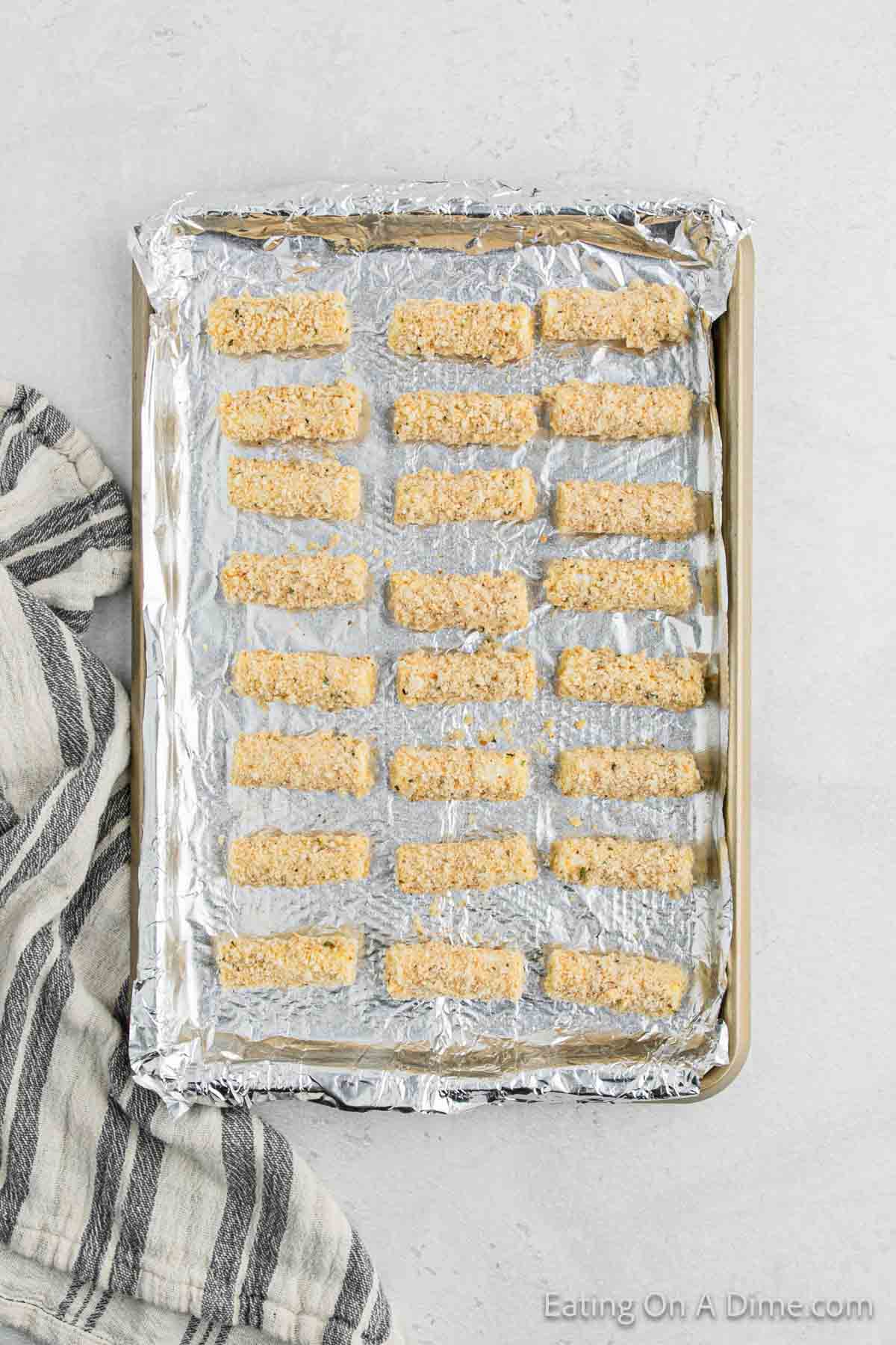 Place on the cheese sticks on a baking sheet