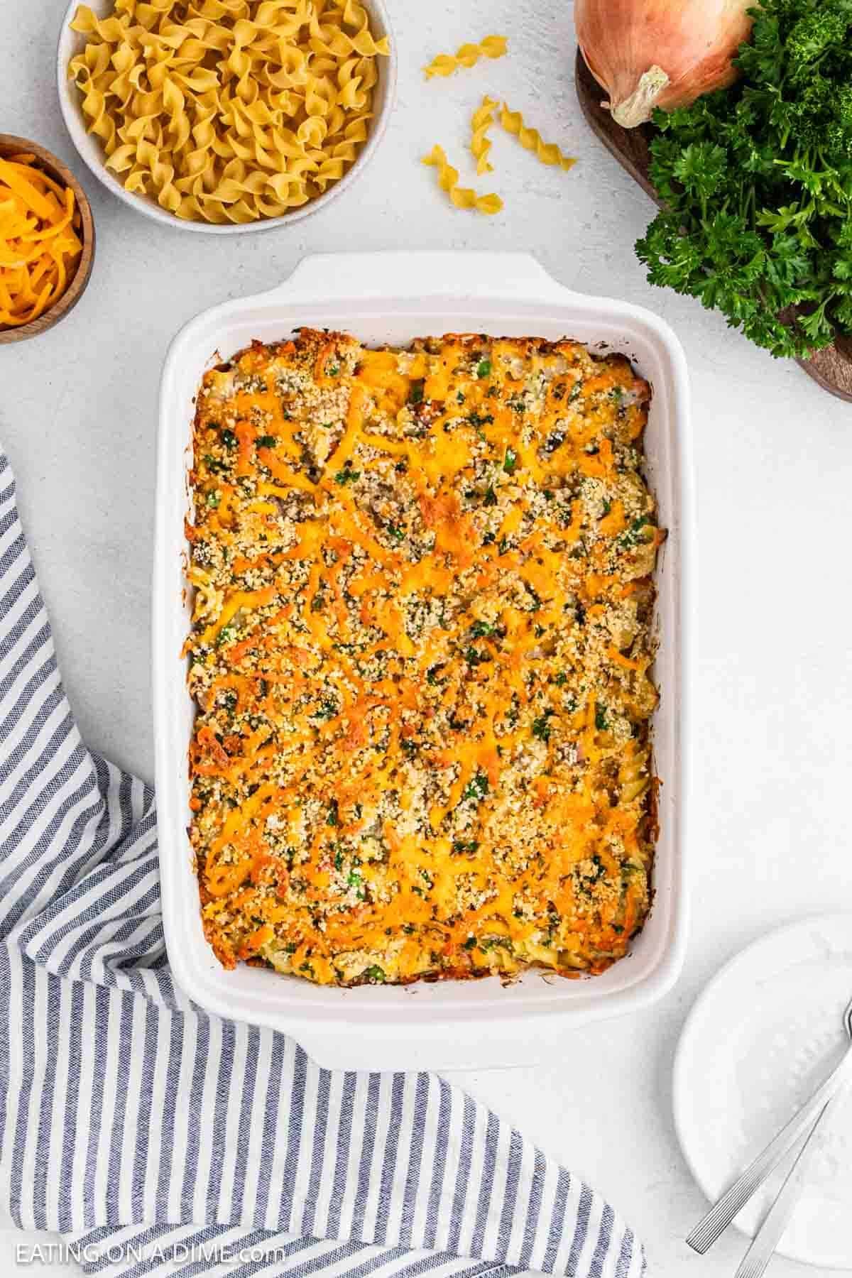 Baked casserole with a golden brown topping in a baking dish.