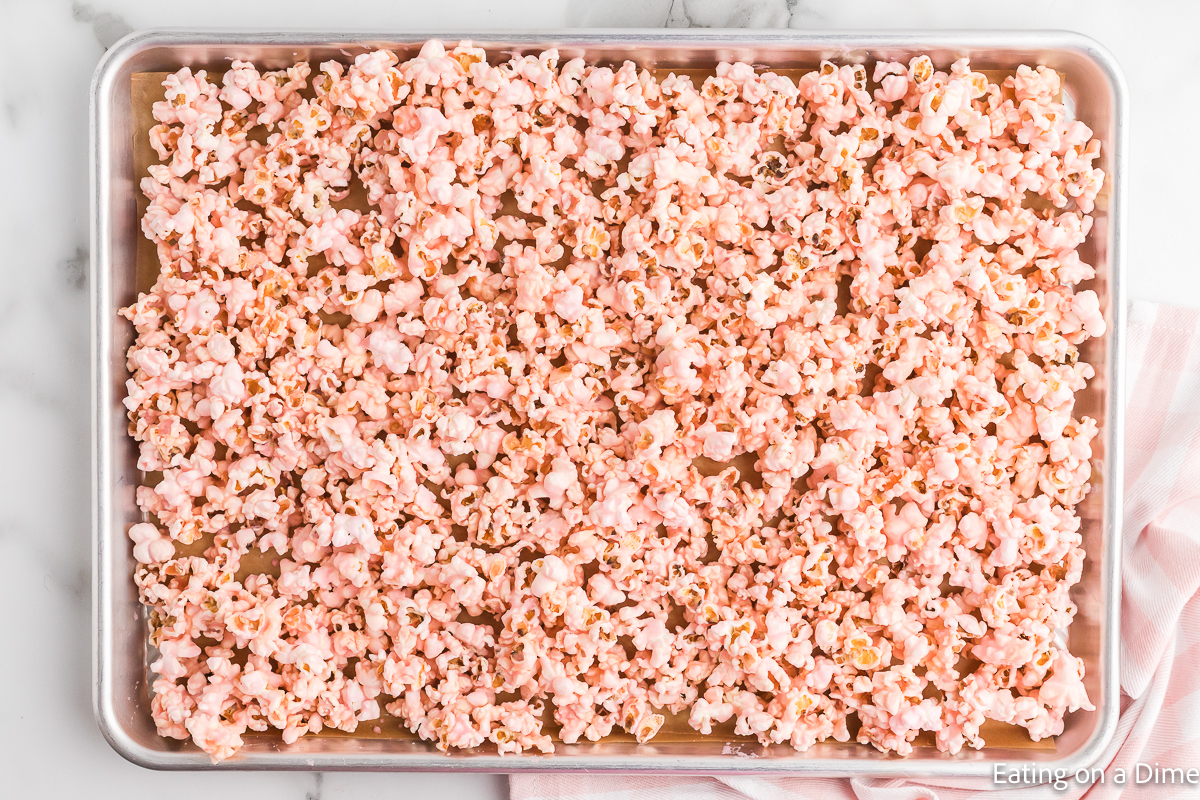 Pink Popcorn on a baking sheet