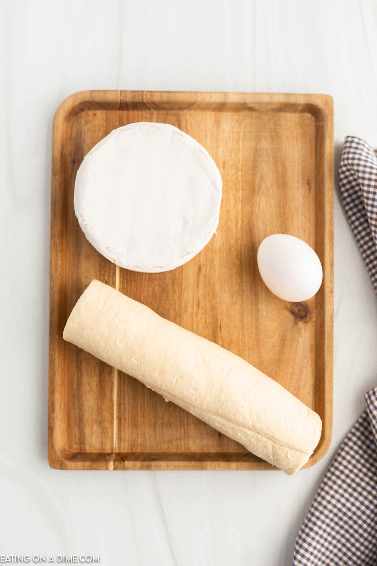 Ingredients needed - crescent dough sheet, brie, egg