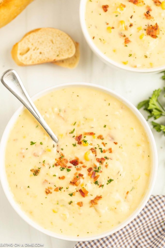 Corn Chowder in a white bowl with a spoon