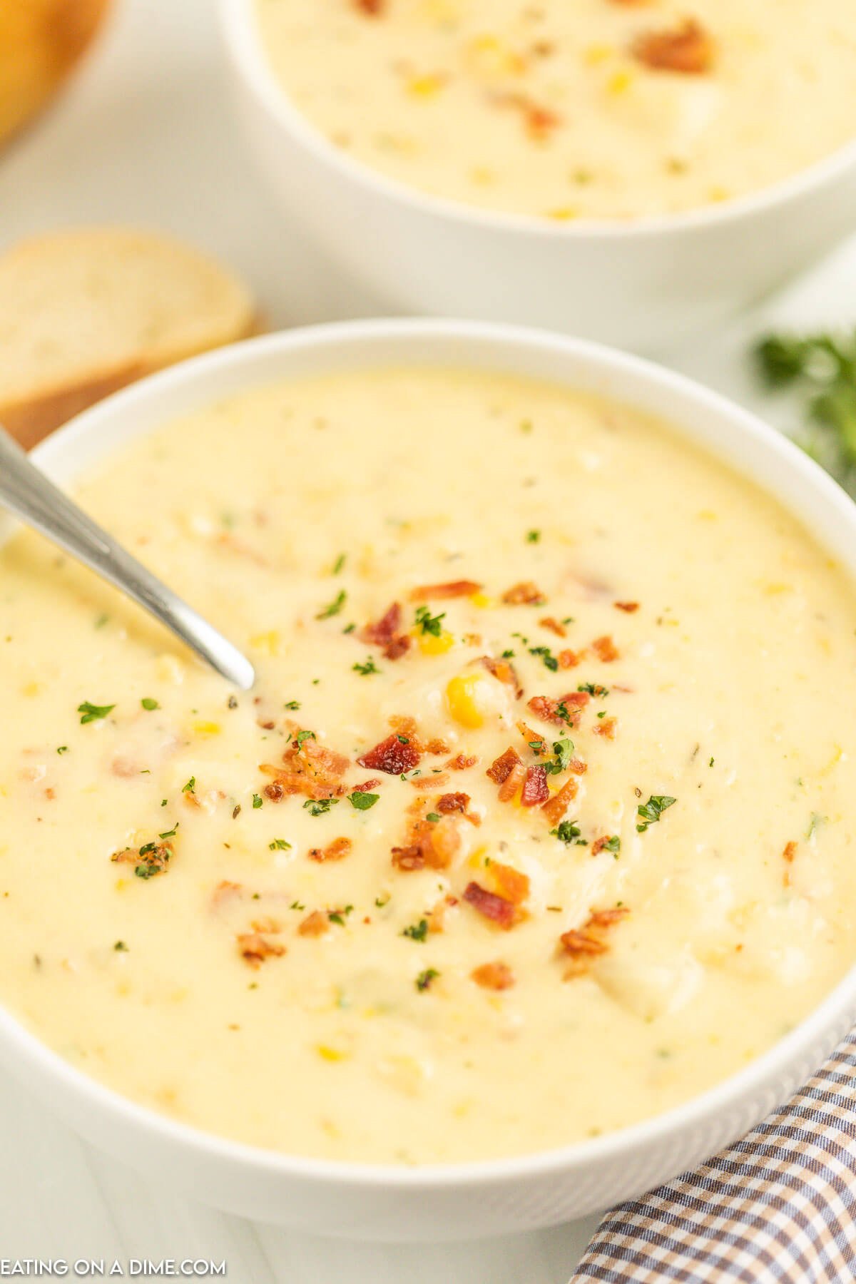 Corn starch in a white bowl with a spoon