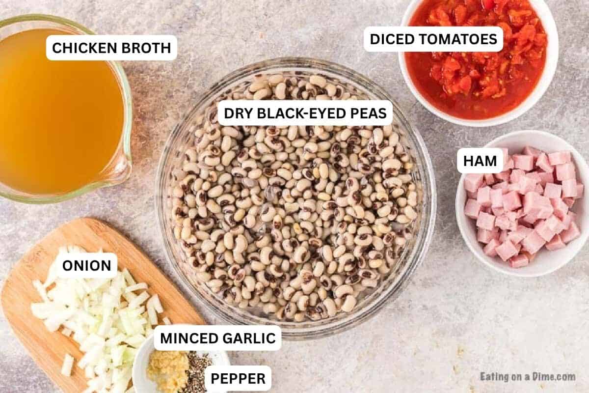 Crock pot black eyed peas recipe is so easy and inexpensive. This is the best way to cook black eyed peas and there is so much flavor! You are going to love these Slow Cooker Black Eyed Peas. This Southern recipe is simple and easy to make but still packed with flavor. Check out this easy black eyed peas recipe! #eatingonadime #blackeyedpeas #crockpotrecipes #slowcookerrecipes #beanrecipes Ingredients for recipe: diced tomatoes, chicken broth, black eyed peas, ham, onion, minced garlic and pepper.