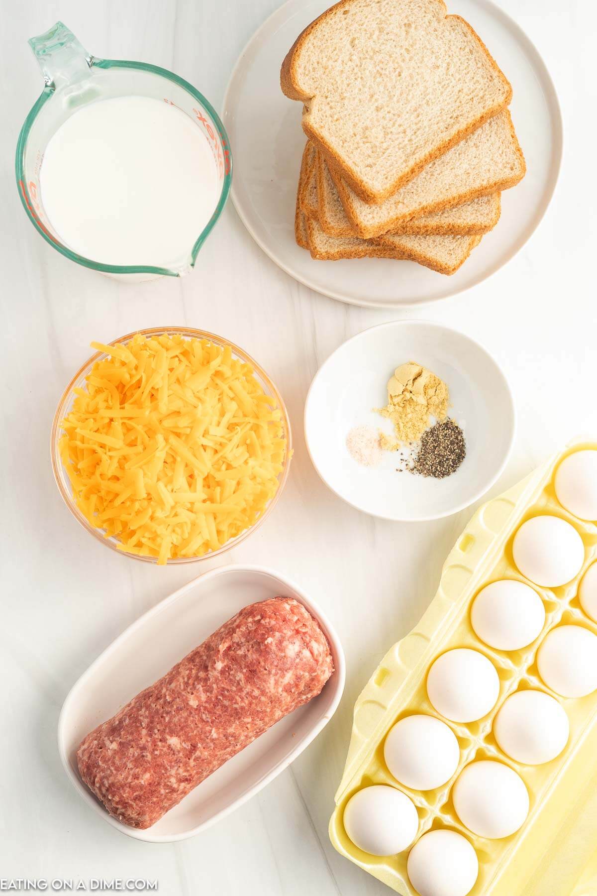 Ingredients needed - pork sausage, white bread, cheese, eggs, milk, dry mustard, pepper and salt