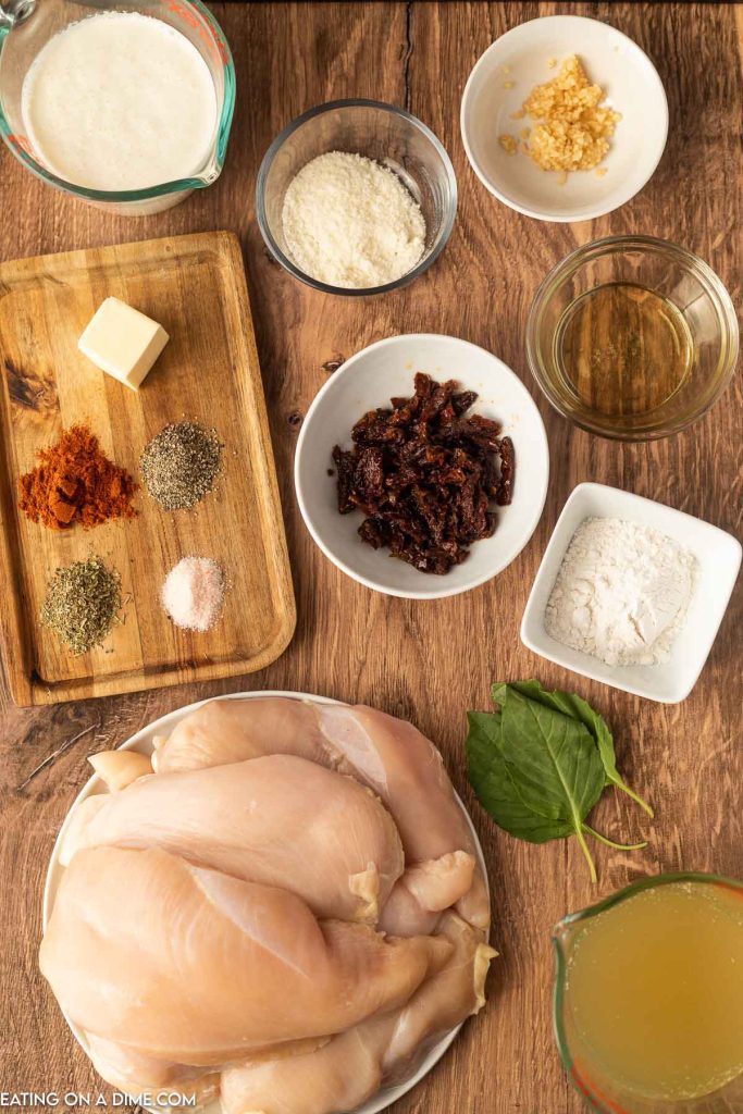 Ingredients needed - chicken breast, olive oil, butter, salt and pepper, italian seasoning, paprika, garlic, broth, flour, heavy whipping cream, sun dried tomatoes, basil, parmesan cheese