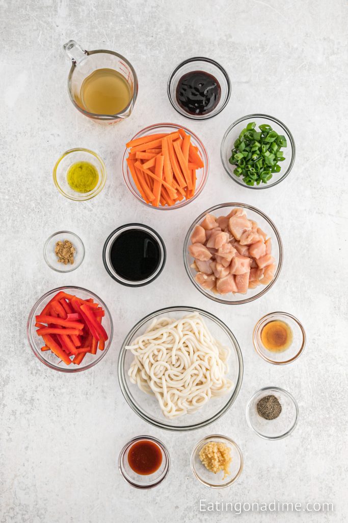 Ingredients needed - Chicken Breast, olive oil, udon noodles, carrots, bell pepper, green onions, sesame oil, soy sauce, sriracha sauce, minced garlic, ground ginger, pepper, chicken broth