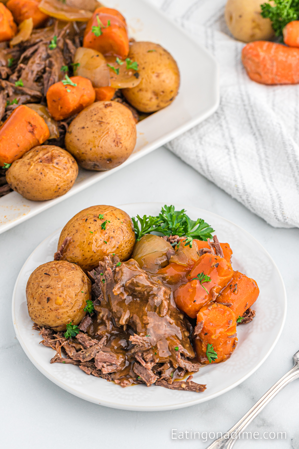 Venison Roast potatoes and carrots on a plate