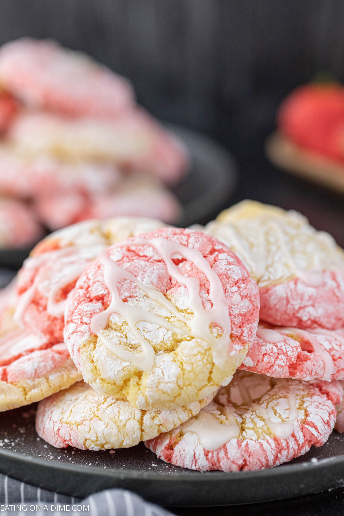 Strawberry and Lemonade cake mix cookies stacked on a plate