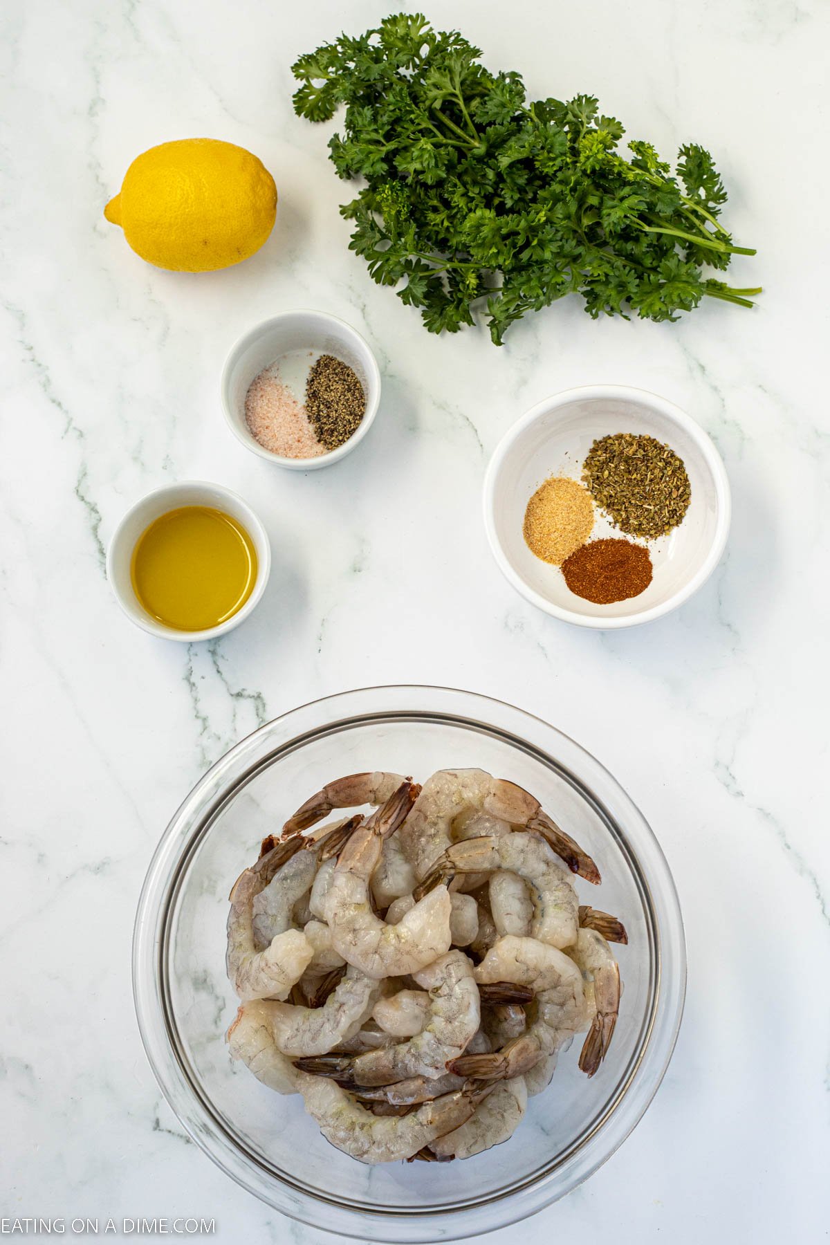 Ingredients for Texas Roadhouse Grilled Shrimp. Large Shrimp, olive oil, salt, pepper, lemon, dried oregano, garlic powder, paprika, parsley, lemon