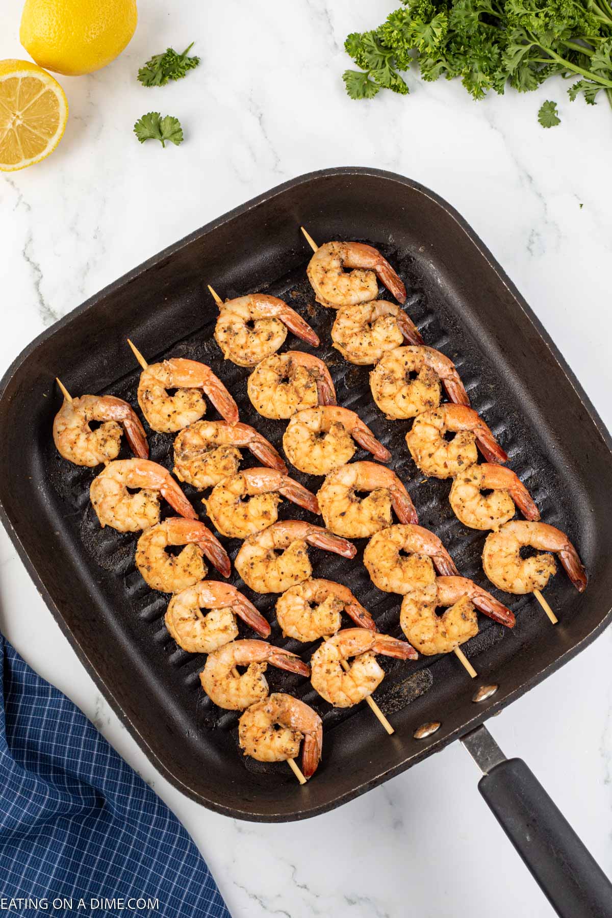 Texas Roadhouse Grilled Shrimp on a grill pan. 
