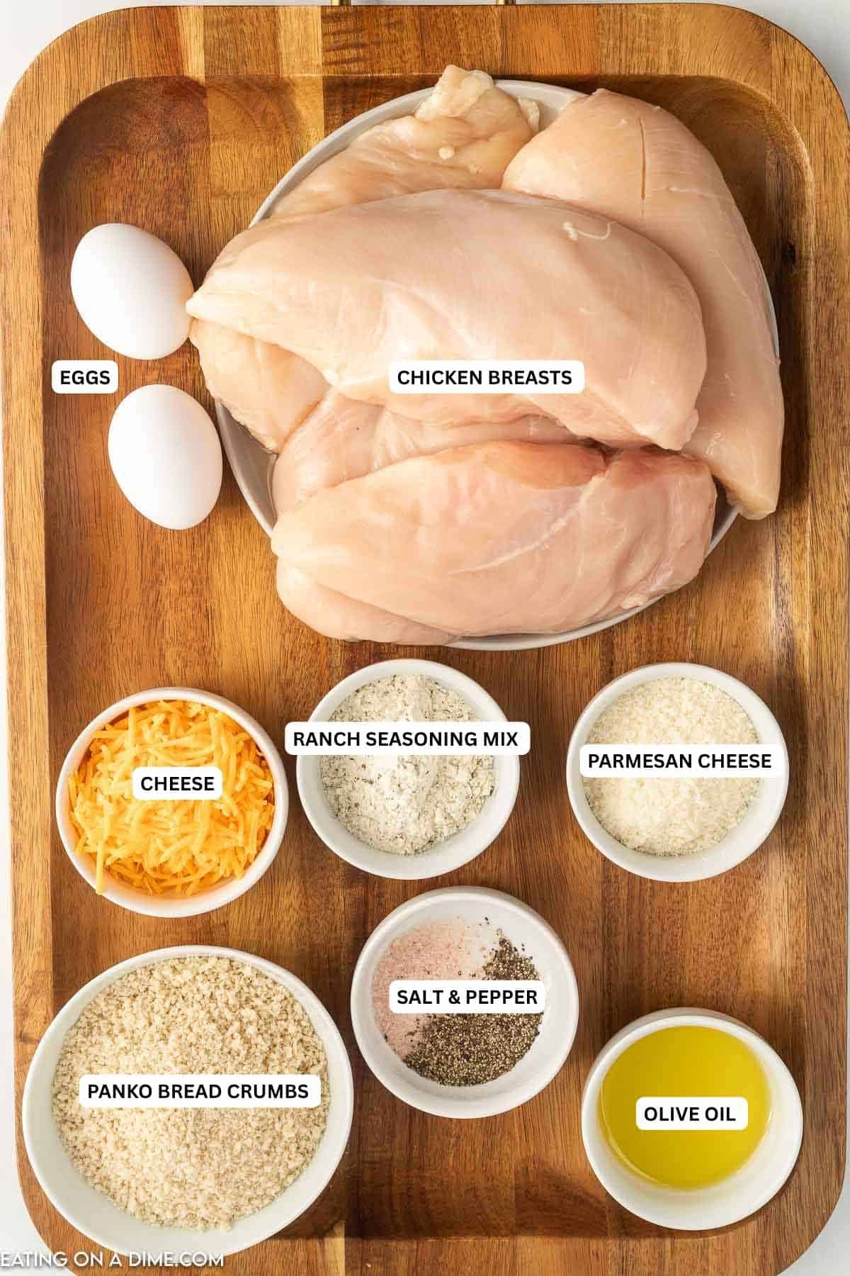 Ingredients for recipe: eggs, chicken breasts, cheese, ranch seasoning mix, Parmesan cheese, Panko Bread Crumbs, salt, pepper and olive oil.
