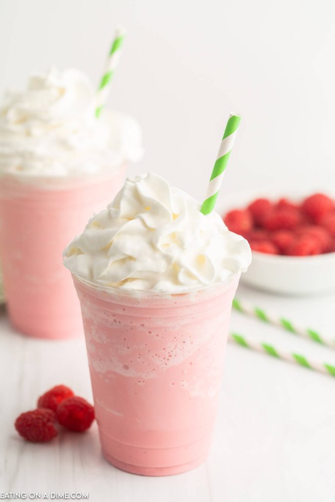 Cotton Candy Frappuccino topped with whipped cream and a straw