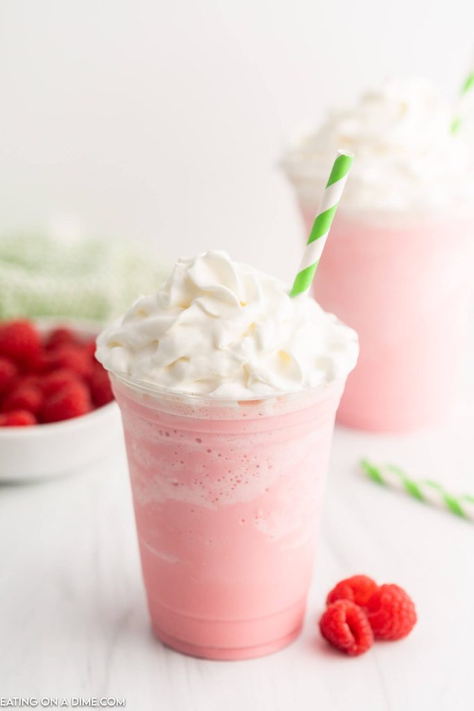 Cotton Candy Frappuccino topped with whipped cream and a straw