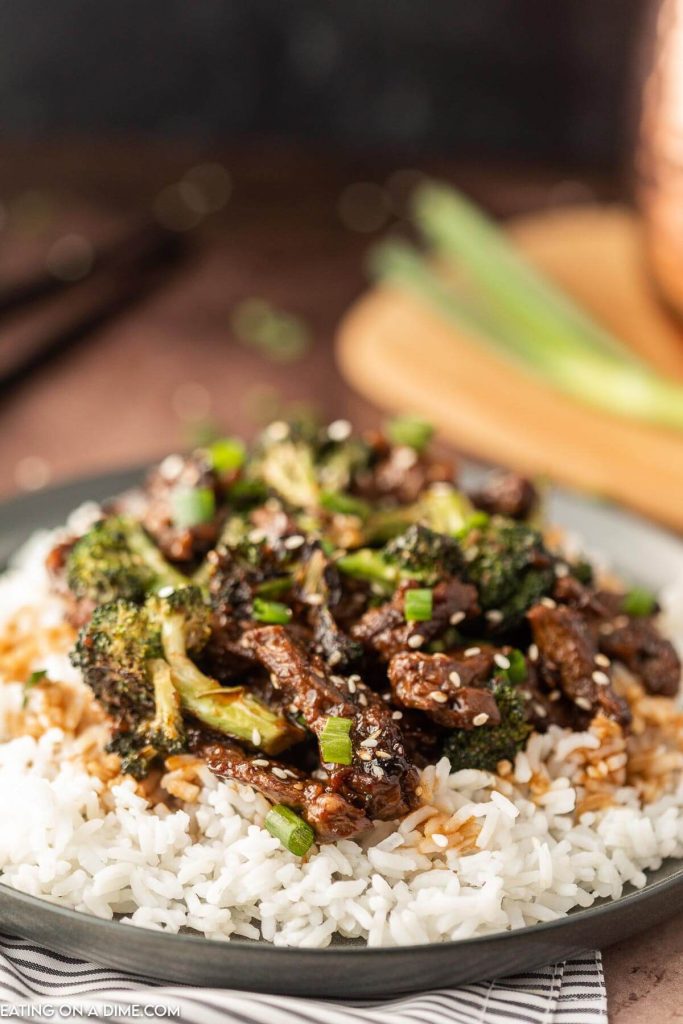 Beef and Broccoli over white rice on a plate