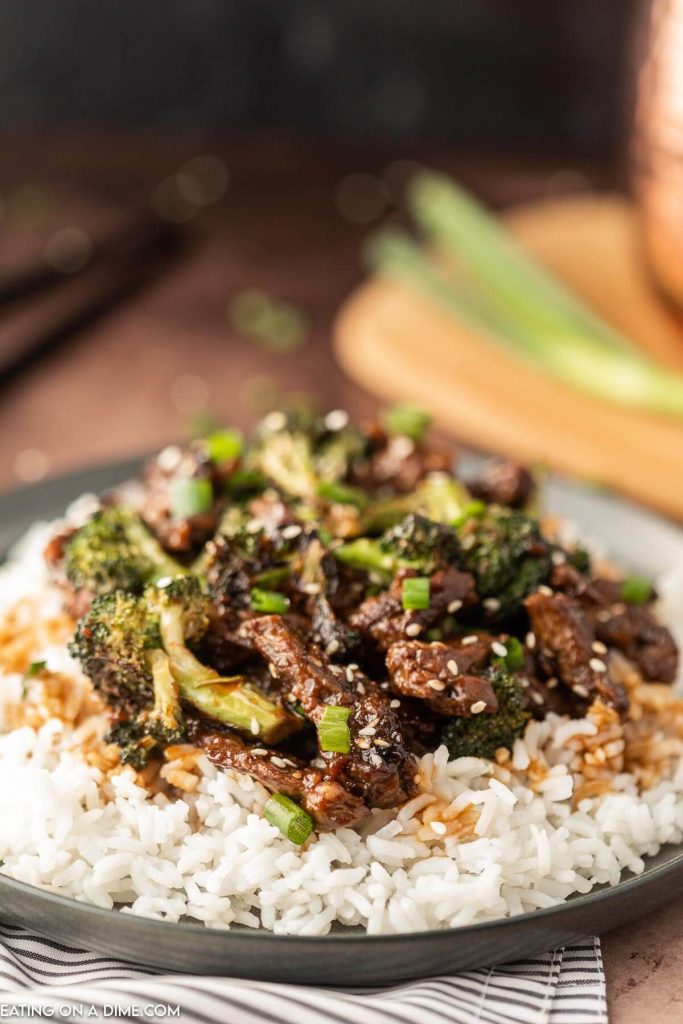 Beef and Broccoli over white rice on a plate