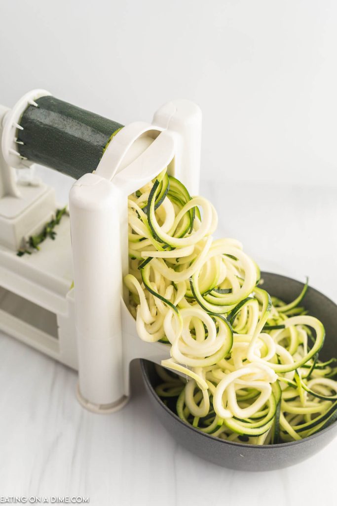 Using the spiralizer to make zucchini noodles