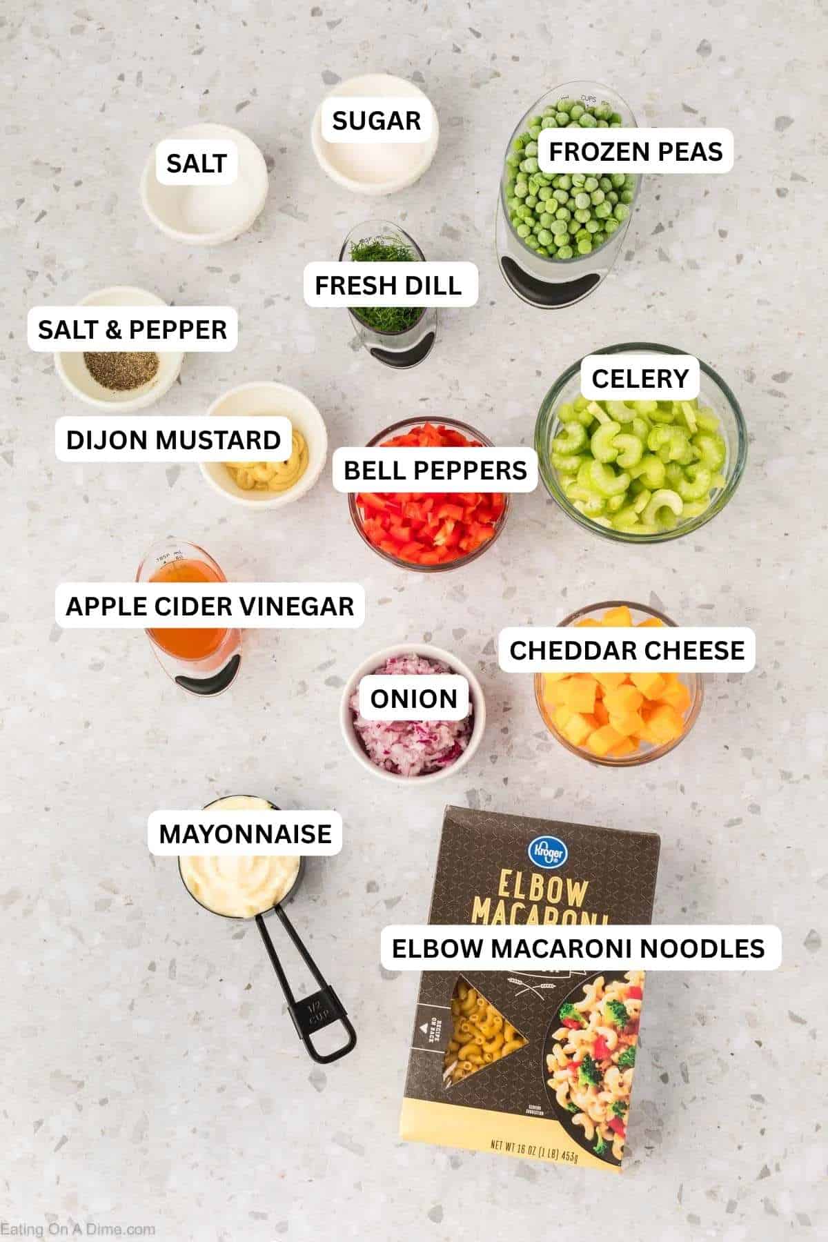 This Easy Macaroni Salad recipe is the perfect side dish to bring to Summer BBQ's, parties and more! Easy macaroni salad is loaded with veggies, cheese and more. You will love the creamy dressing in Macaroni salad recipe. Try this Pasta salad with mayo. Everyone will love this simple Elbow macaroni salad! Ingredients for recipe: salt, sugar, frozen peas, fresh dill, salt & pepper, Dijon Mustard and dill.