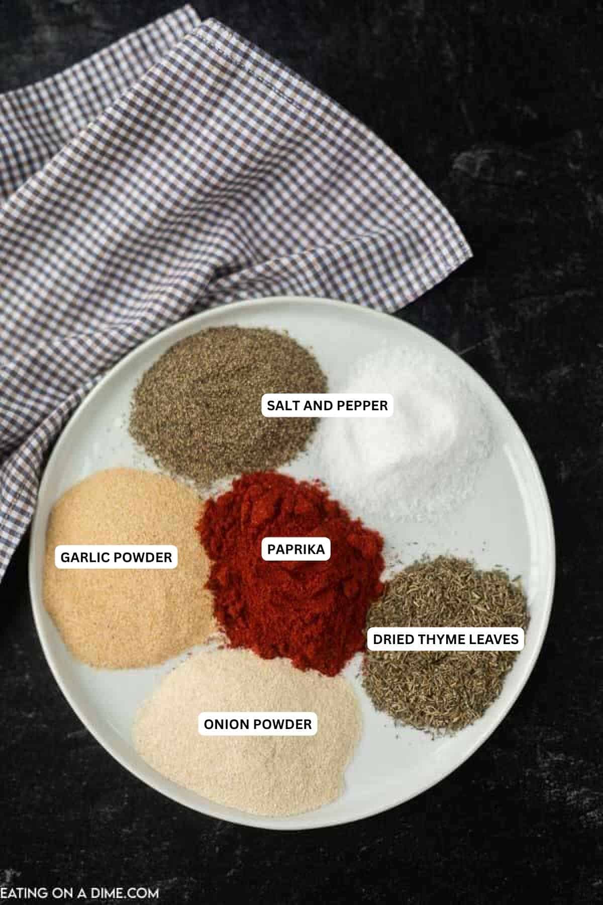 Ingredients for recipe: salt, pepper, garlic powder, paprika, onion powder and dried thyme leaves.