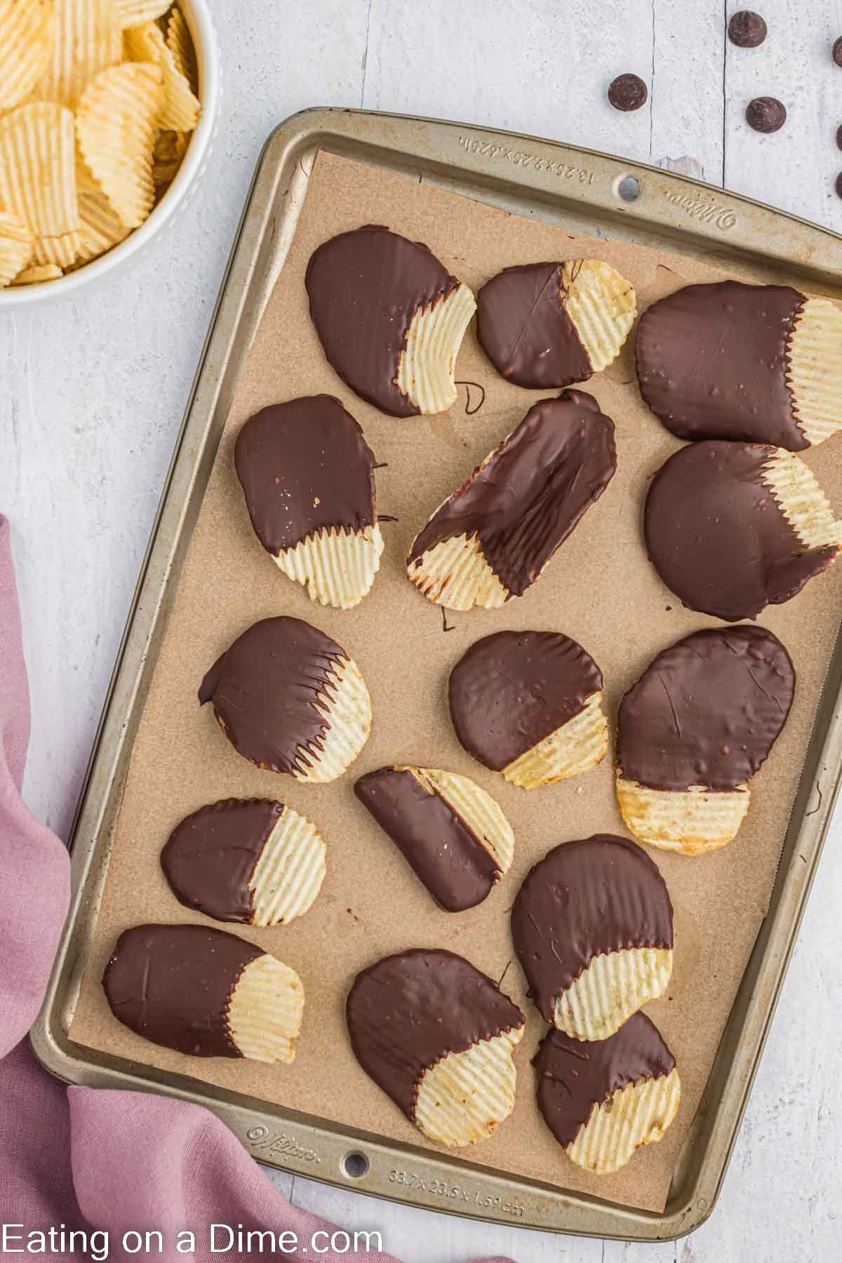 Chocolate Covered Chips on a baking sheet