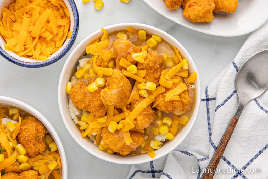 KFC Bowls loaded with chicken, cheese, corn and mashed potatoes