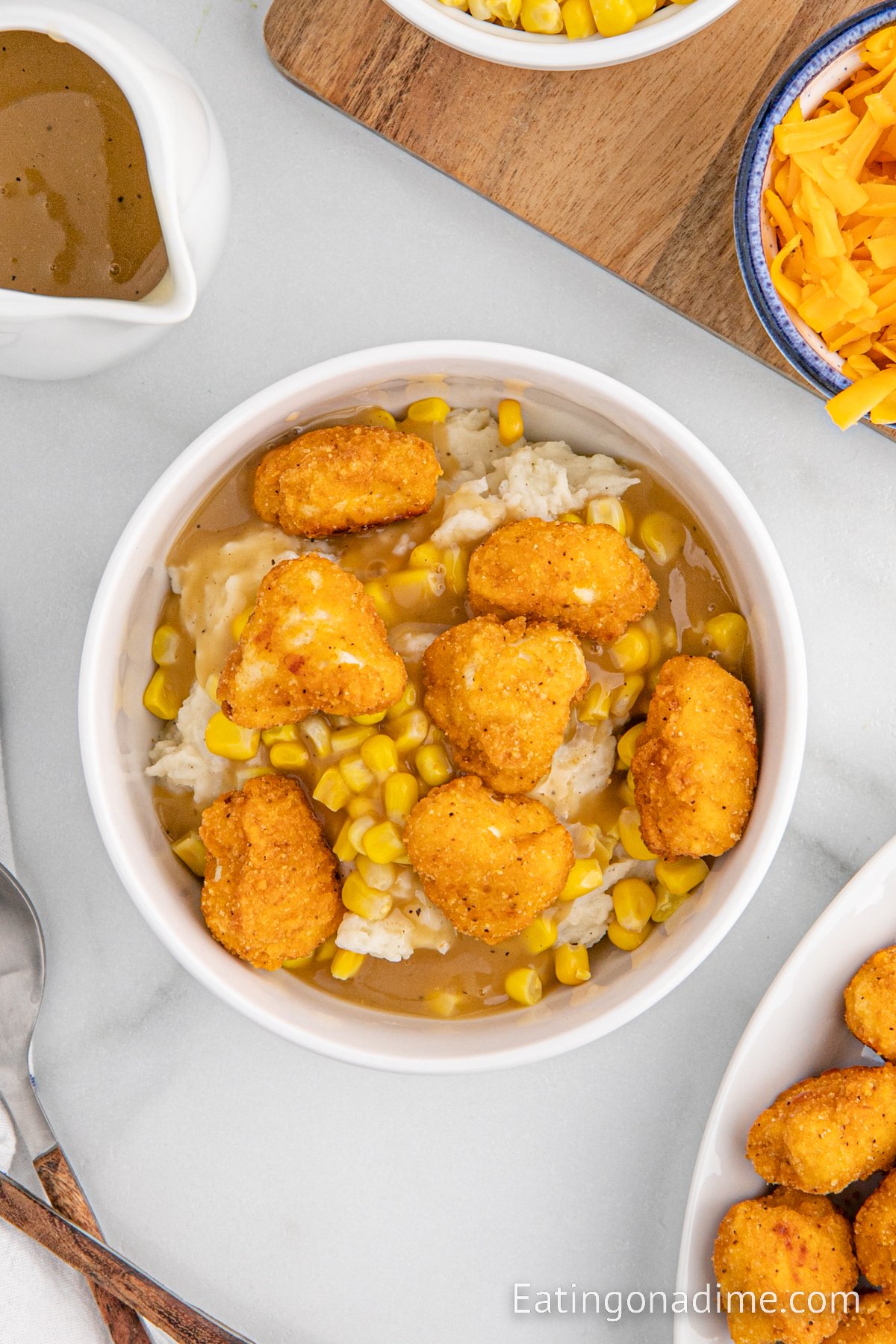 KFC Bowls loaded with chicken, cheese, corn and mashed potatoes