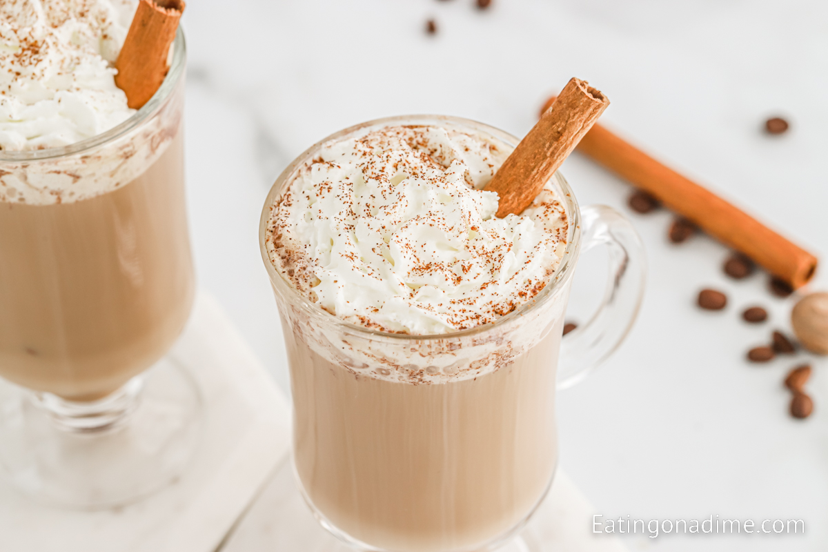 Cinnamon Dolce Latte topped with whipped cream, cinnamon and a cinnamon stick