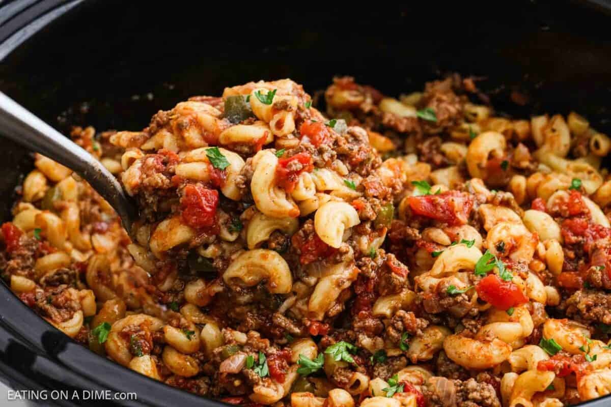 Goulash being served out of the crockpot.