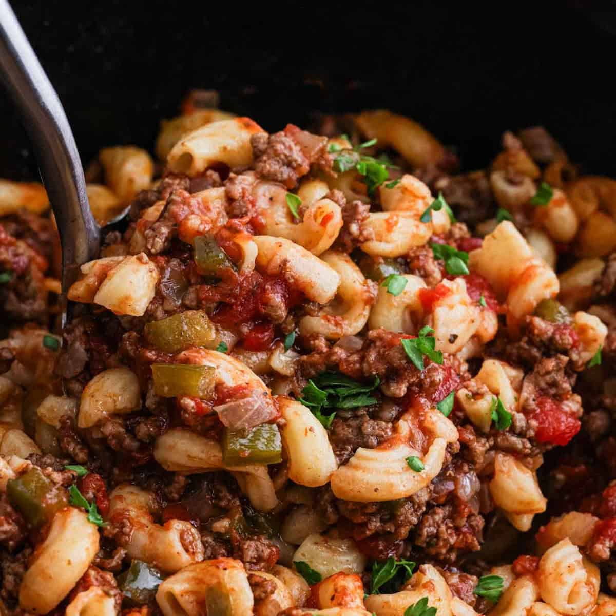Goulash being served out of the slow cooker.