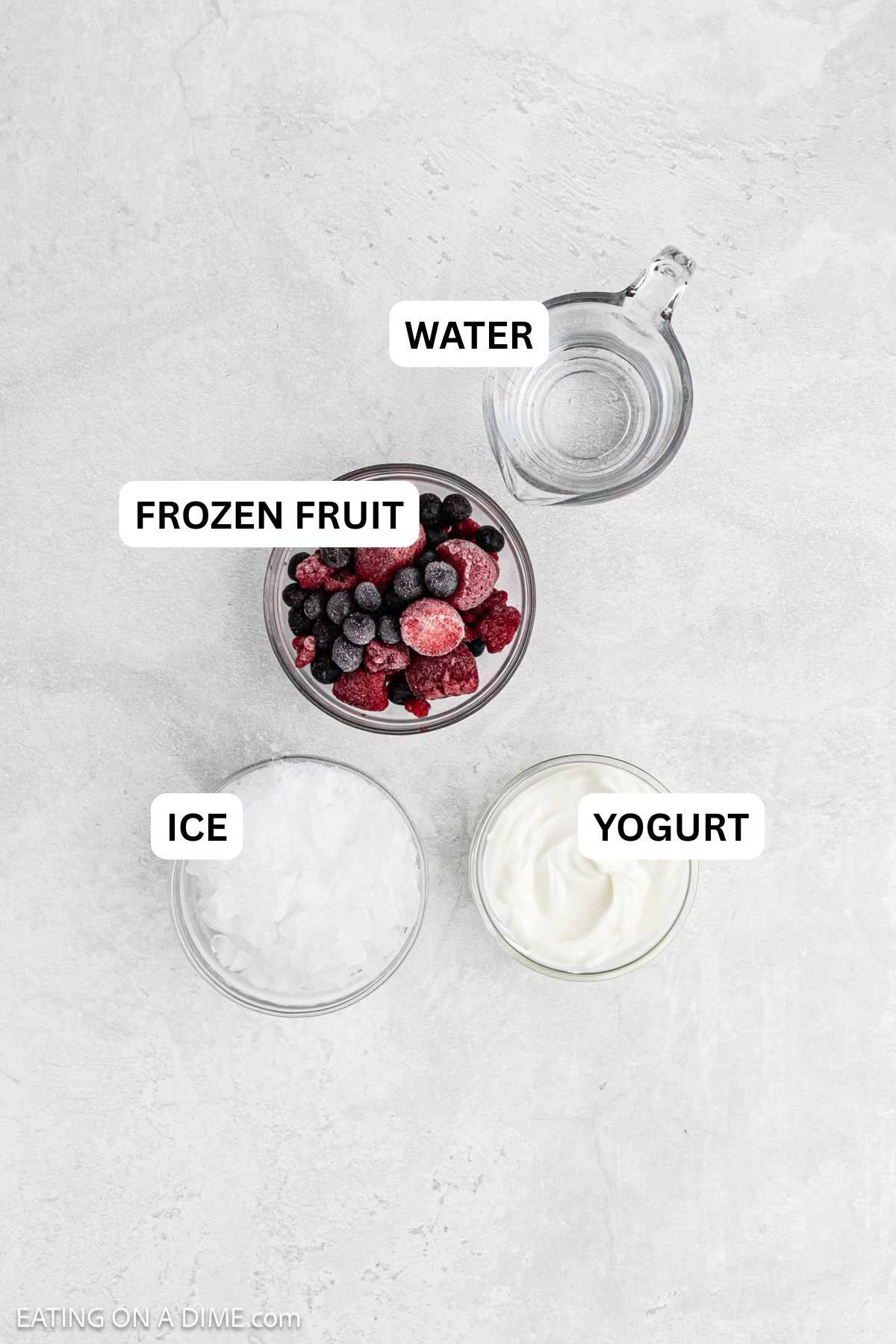 Ingredients to make this recipe which includes frozen fruit, ice, yogurt and water.
