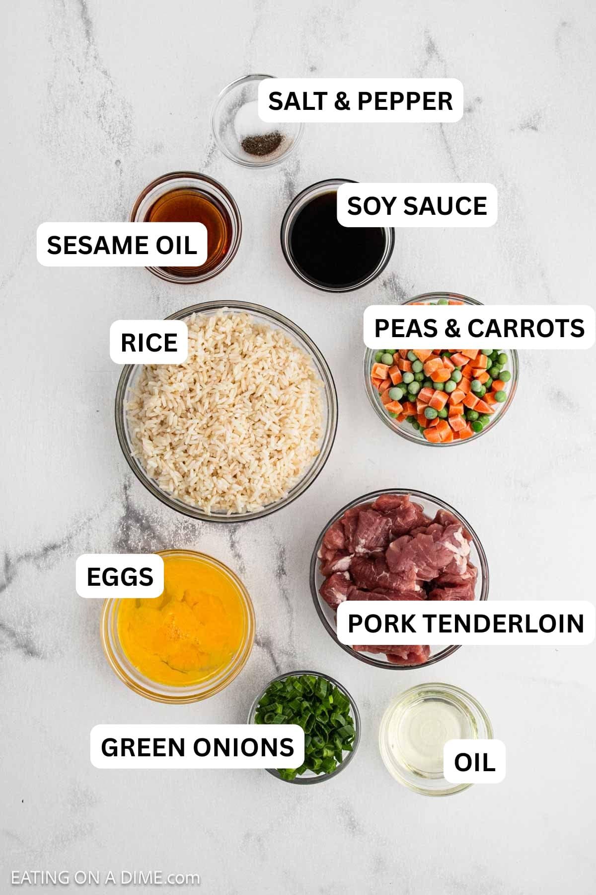 Ingredients to make recipe which includes pork tenderloin, rice, peas and carrots and more.