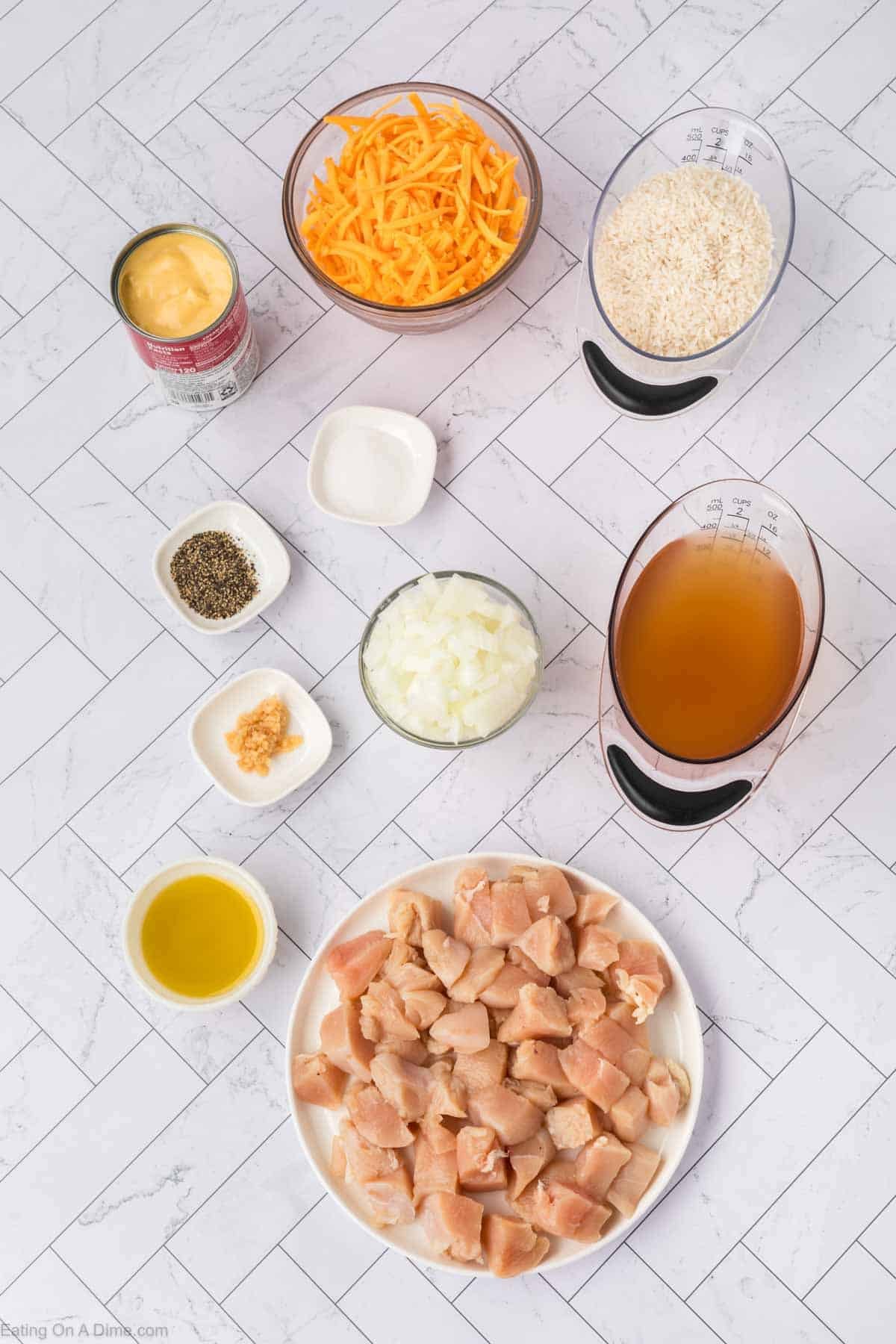 Ingredients - chicken breast, olive oil, minced garlic, onion, broth, cream of chicken soup, white rice, salt, pepper, cheddar cheese