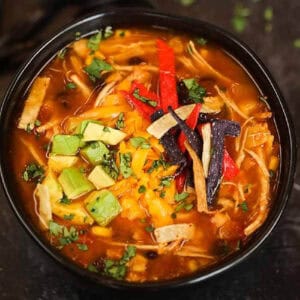 Chicken tortilla soup in a bowl.