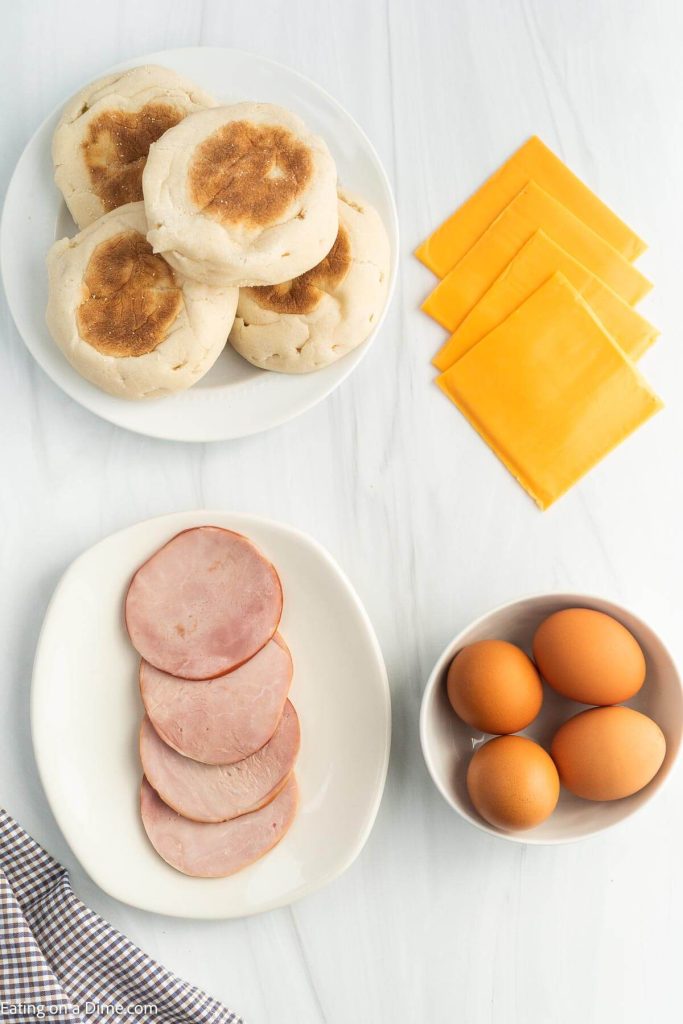 Ingredients needed - butter, English Muffins, Canadian Bacon, Eggs, Water, Slice Cheese