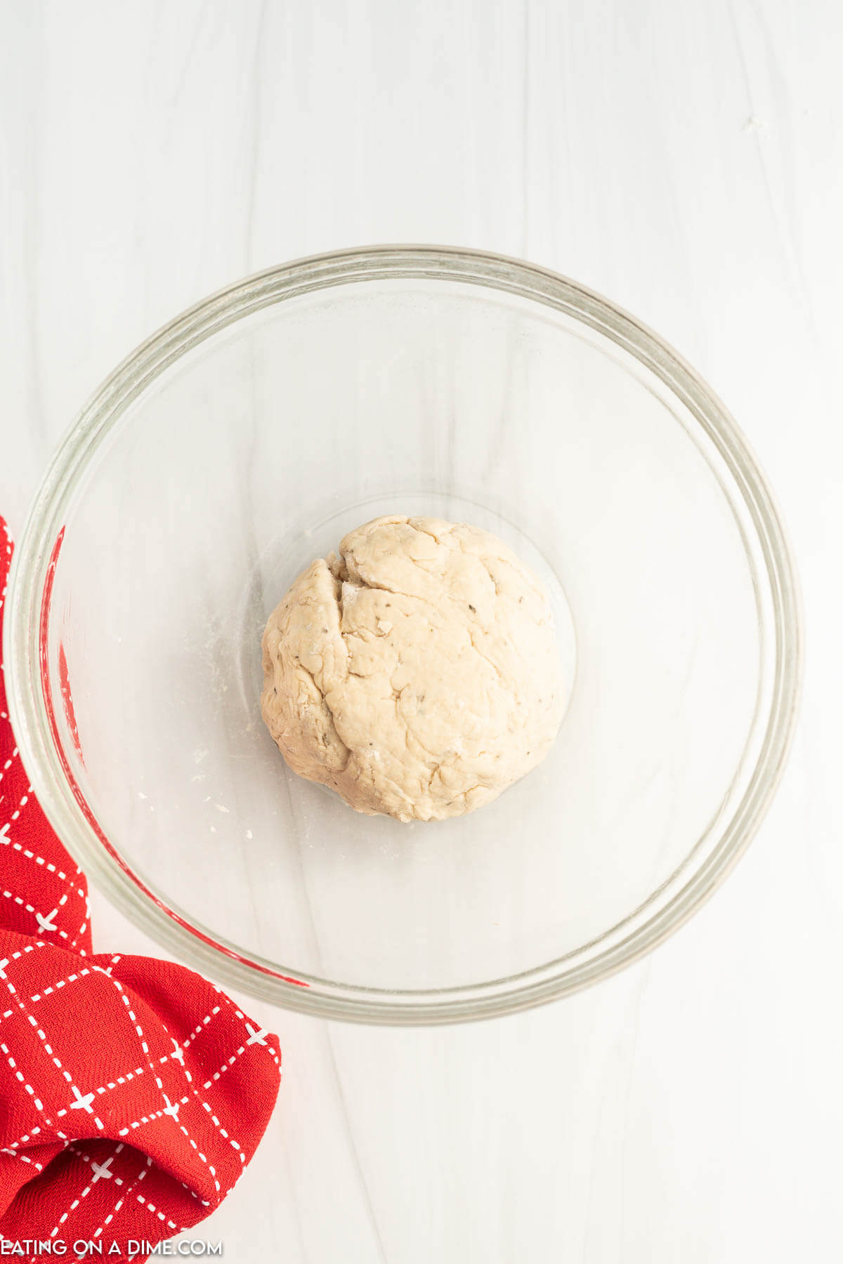 Pizza dough ball in a bowl