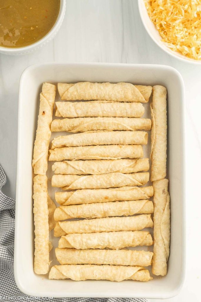Taquitos in a baking dish