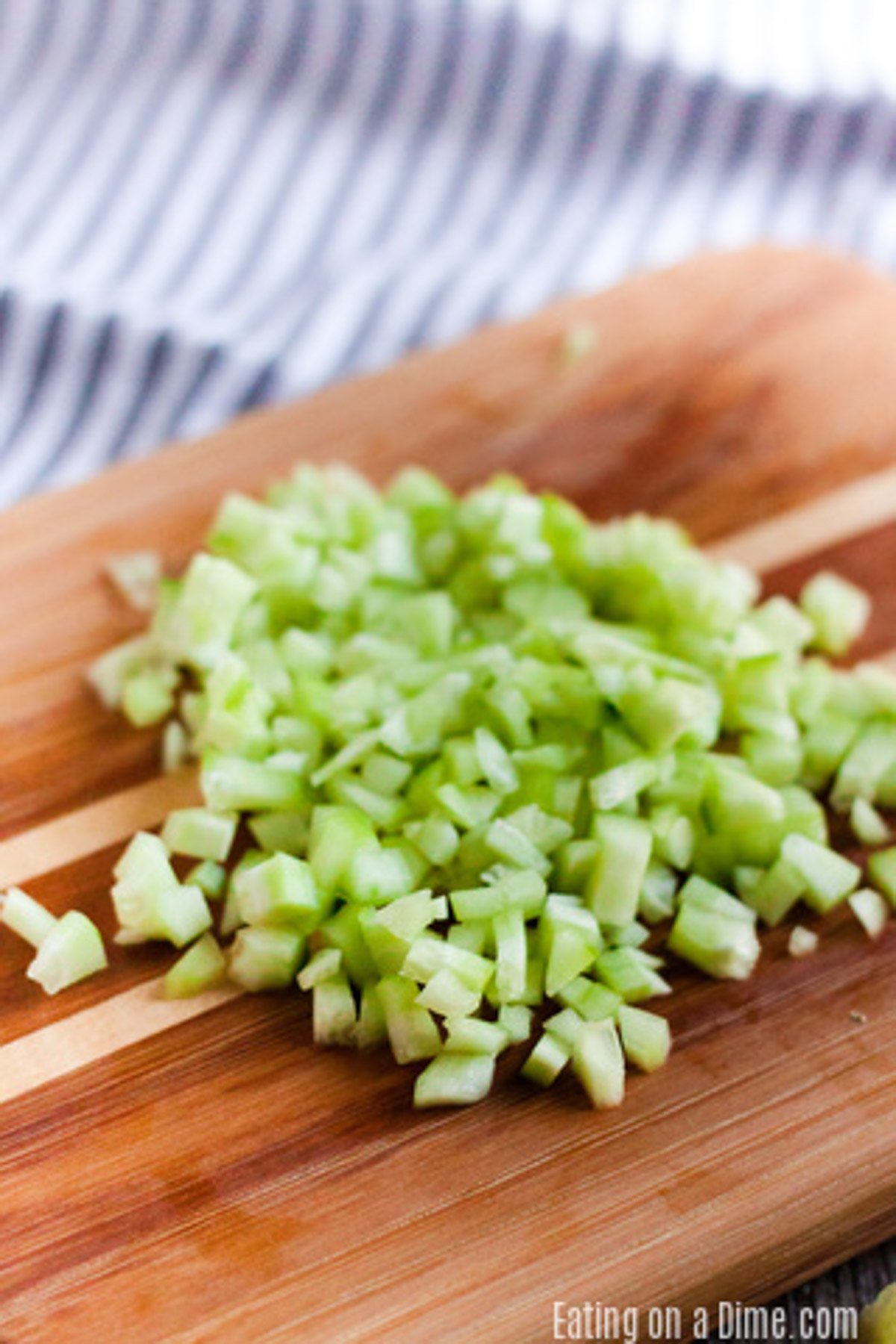 Chopping the veggies on a cutting board