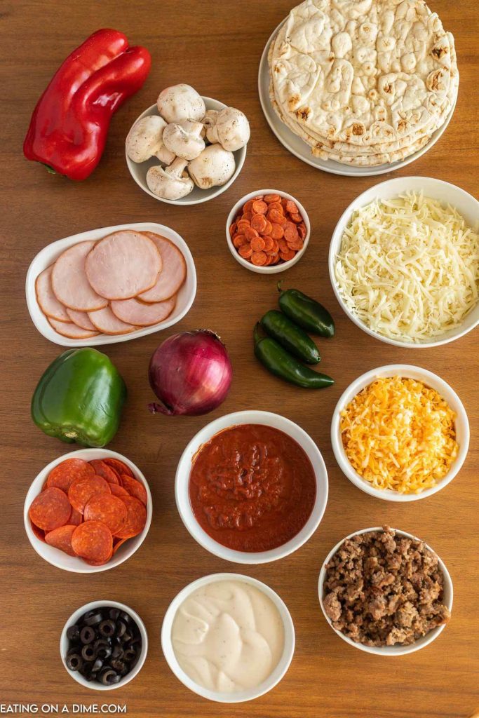 Bowls of toppings and sauce for your pizza